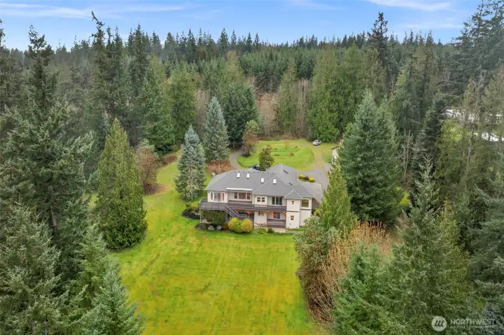 "back" view of the home as you drive up the driveway.