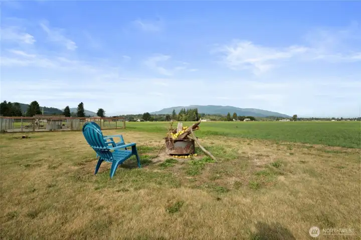 Firepit area and unobstructed view of the mountains! Hay fields surround securing your views.