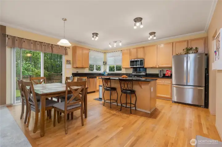 Large kitchen with room for table and island seating