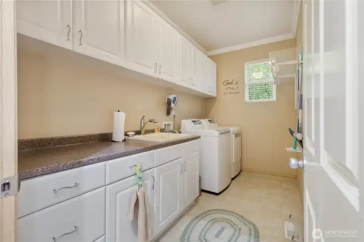 Huge laundry room with endless storage