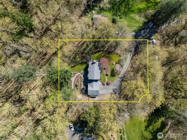 Aerial view of the property, with boundaries outlined. Aerial view of the property, with boundaries outlined.