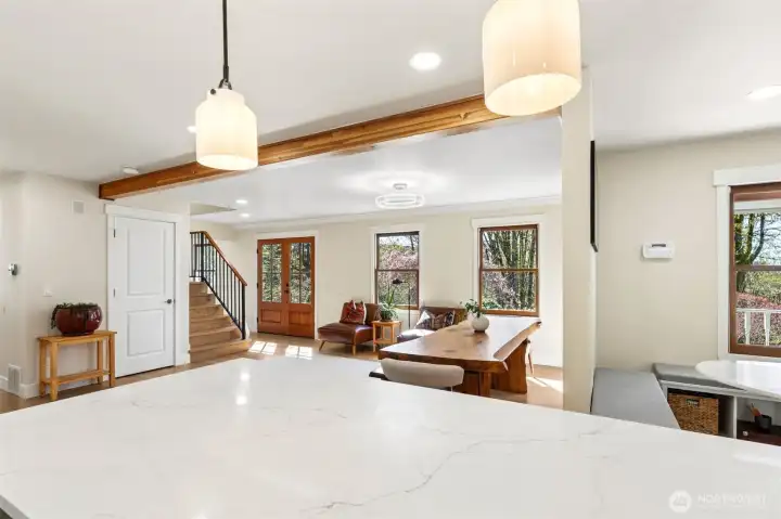 Kitchen looking toward the dining area and main entry. Kitchen looking toward the dining area and main entry.