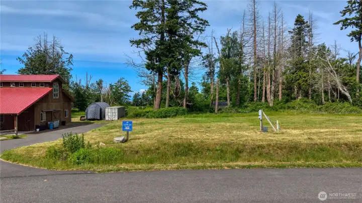 Lot is next to the Barn/clubhouse . What a great benefit