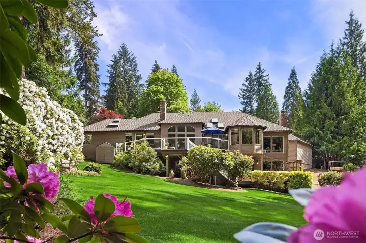 Lush gardens surround this stately home