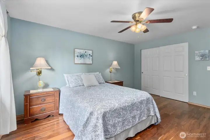 Large primary suite with dual closets, abundant natural light, and plenty of room to unwind.