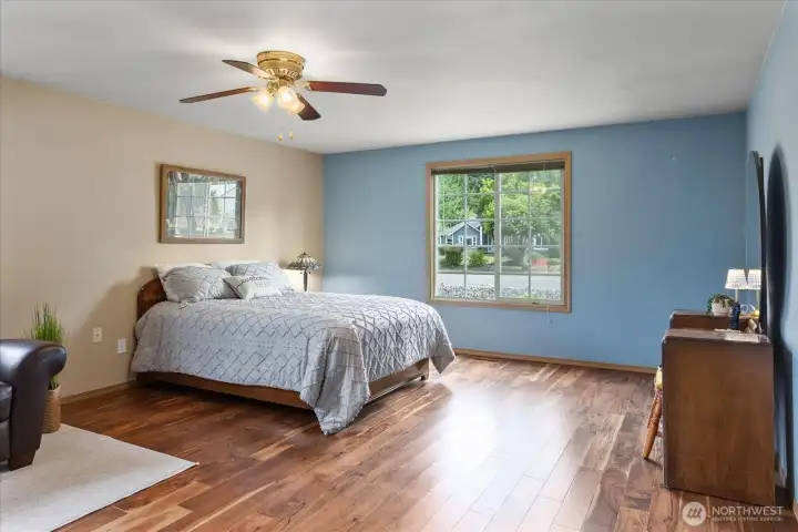 Versatile secondary bedroom is ideal for family, guests, or a home office with beautiful natural light.
