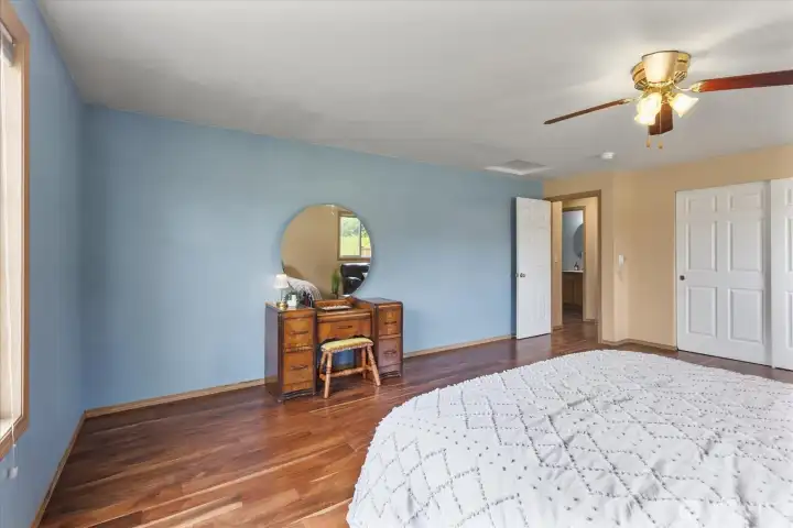 One of the home's standout secondary bedrooms, this spacious room offers exceptional flexibility for guests, a home office, a hobby room, or everyday living.