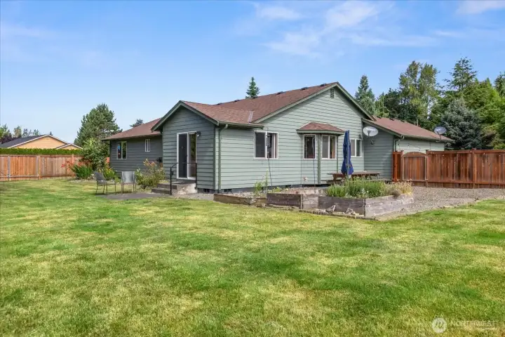 Expansive backyard space offers endless possibilities for entertaining, recreation, gardening, or simply enjoying the peaceful surroundings.