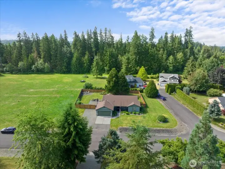 Enjoy a peaceful neighborhood setting with spacious homesites, tree-lined streets, and scenic surroundings.