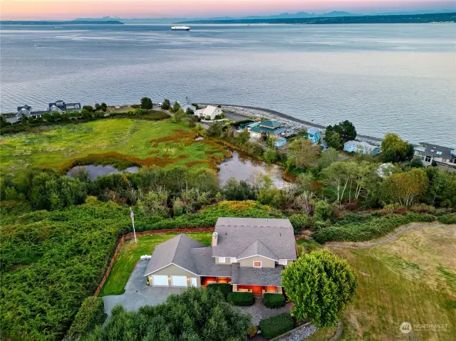 Nature-filled greenbelts and privacy buffers on 4 sides of home.