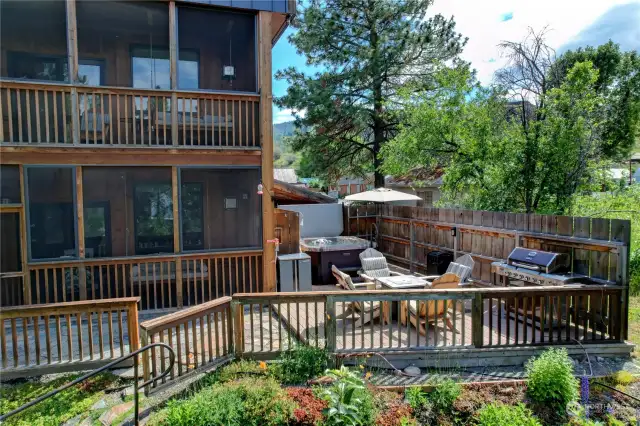 Enjoy the river view complete with heaters, fire pit, comfortable seating and a gas BBQ grill.