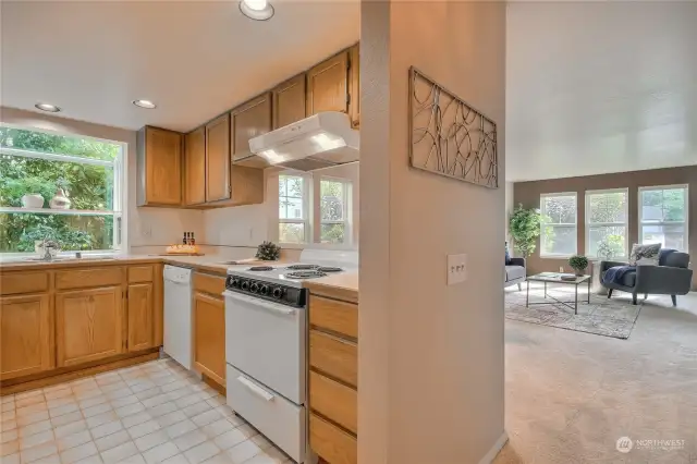 Kitchen open to living and dining area.