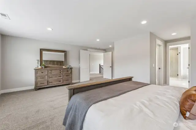 Primary bedroom ensuite with walk-in closet.