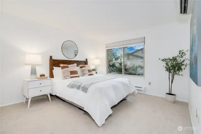 Light-filled large bedroom with double closets.