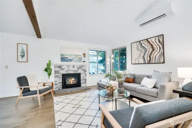 A light, bright and spacious living room with vaulted ceilings and Western exposure.