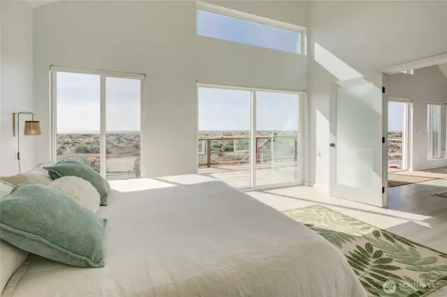 Primary suite with access to deck.
