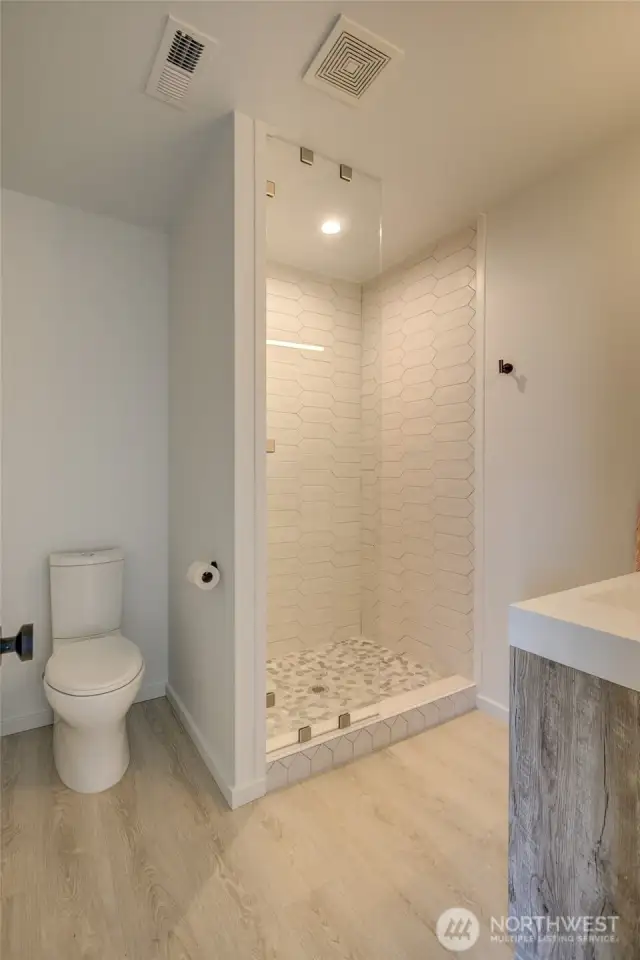 Main level bathroom w/shower.