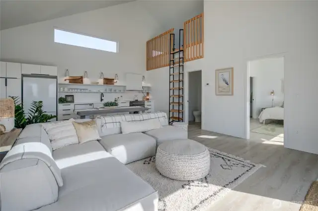 The Great Room upstairs is where you'll want to be!  View of ladder to cozy loft just off kitchen.