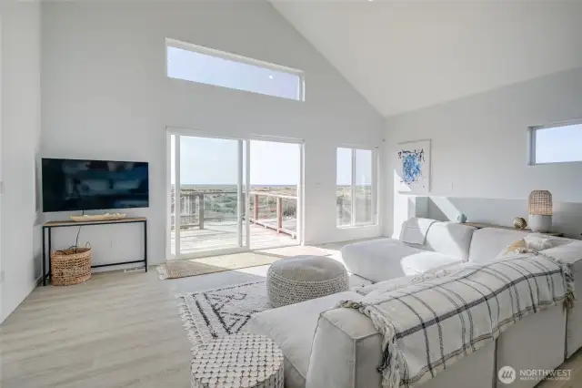 View out to the deck off great room.  Plenty of space to make the TV area bigger if desired.