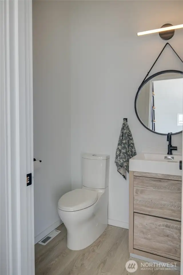 Half bath off great room for guests.