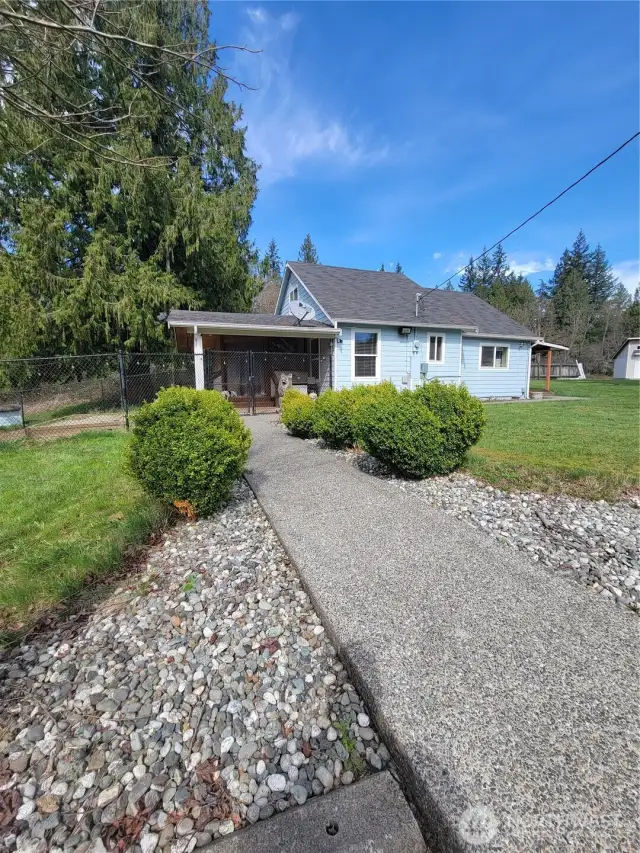 Sidewalk to the home.