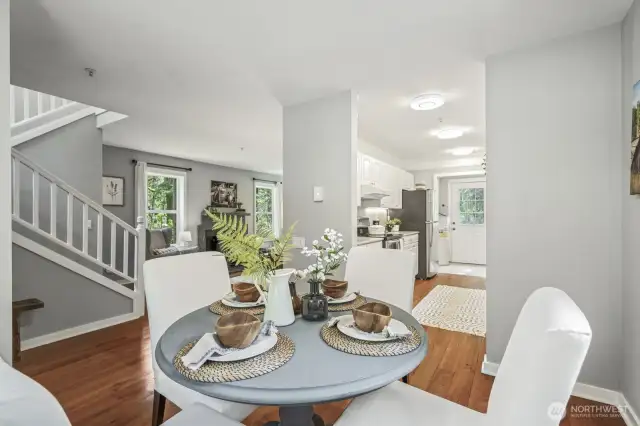 A generous-sized dining room sits between the living room and kitchen, offering a perfect space for entertaining.