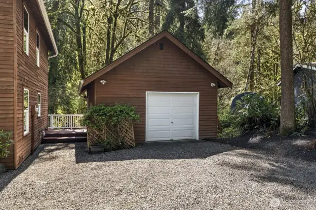 The oversized garage features an EV charging station and plenty of room for tools, hobbies, and equipment—perfect for projects, storage, or your next adventure-ready setup.
