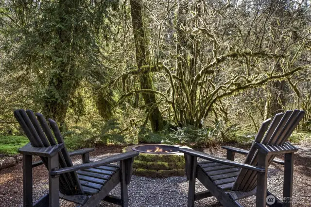 Relax by the fire pit, listening to the soothing sounds of the year-round creek.