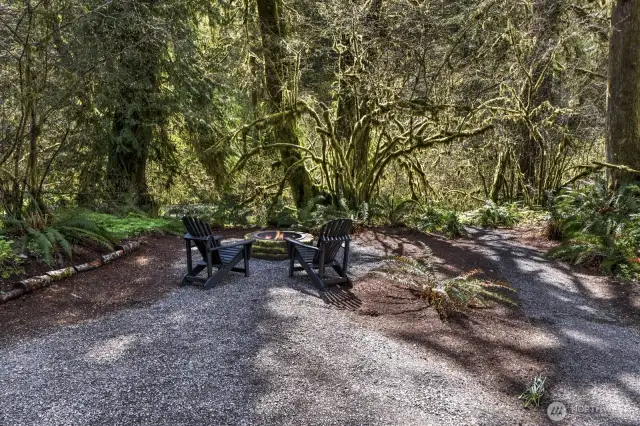 A private trail winds through the natural landscape, leading to the tranquil creek.