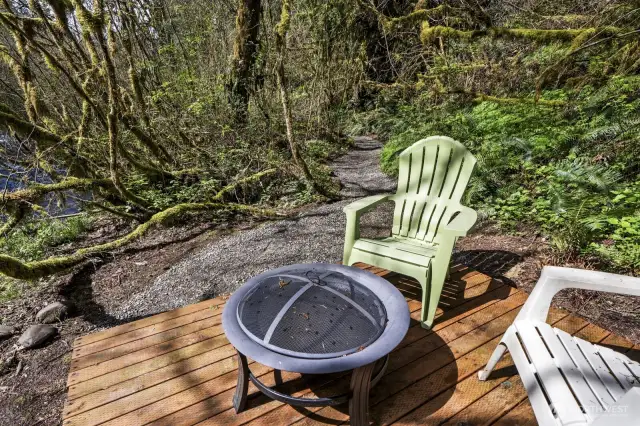Tucked among the trees, the deck and private trail offer unmatched privacy and immersion in nature—perfect for quiet mornings and wildlife watching.