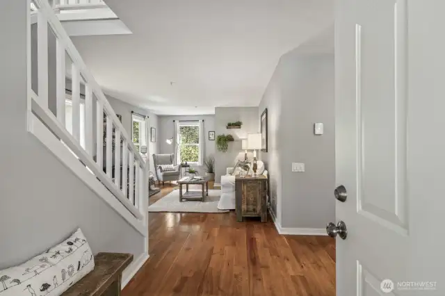 Step inside to a bright, open-concept layout where the living, dining, and kitchen spaces flow effortlessly together.