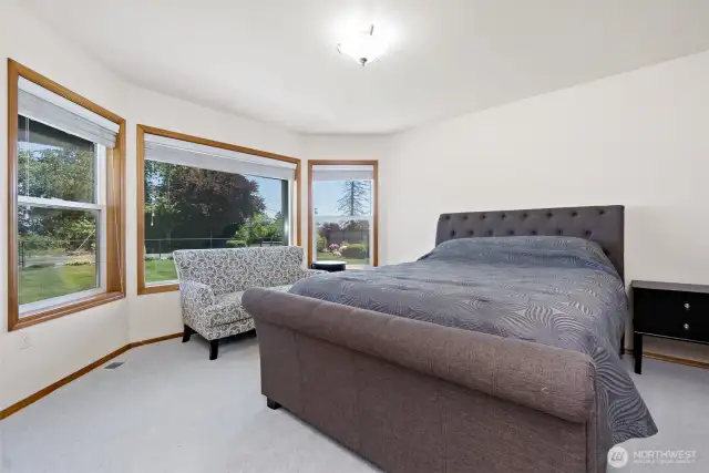 Main floor bedroom with walk in closet and attached to Bathroom
