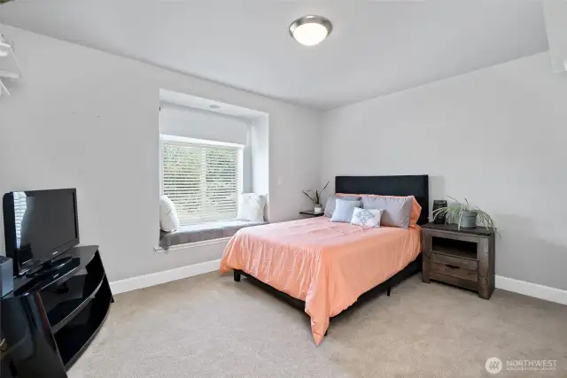 Second floor big bedroom with bench window, walk in closet and connecting bathroom