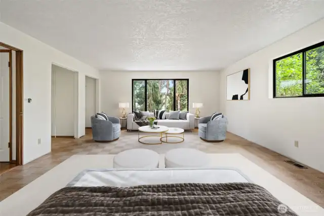 Very large bedroom just down the hall from the kitchen, dining & living room. 2 closets and virtually staged to show the potential and size of this room!