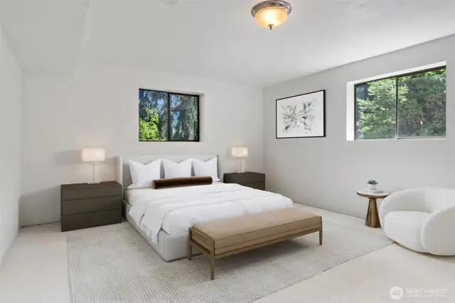 Lower level bedroom with 3/4 bathroom off the hall just outside the door. Currently concrete floor - Virtually staged to show potential of this space!