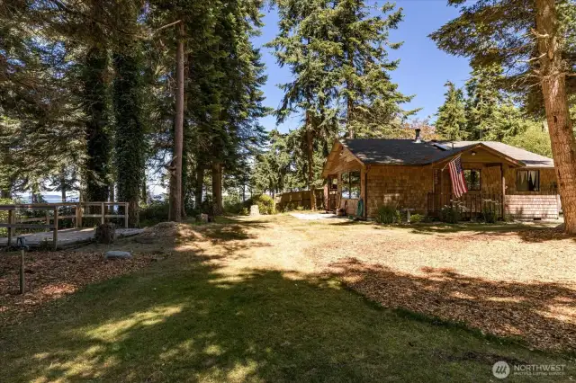 Scenic viewing platform facing the water, and darling beach cabin! RV hook ups are right here.