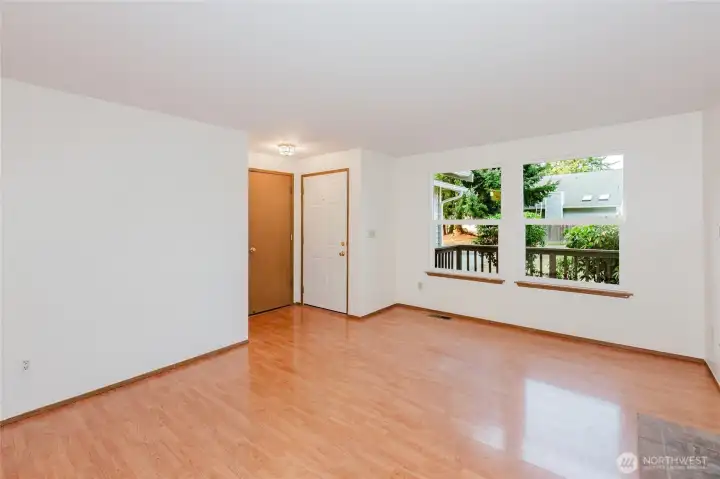 Garage door and coat closet on the left