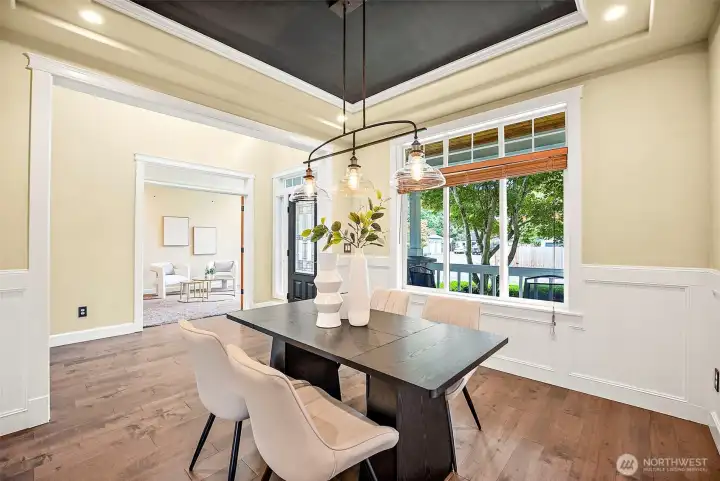 Formal dining room with Industrial black metal with clear glass for a modern classic look.