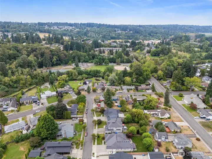 Aerial view looking toward Clarks Creek Park North. Park features baseball/softball diamond, tennis/pickle ball courts and trails.