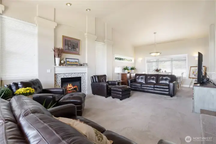 Open-concept living room with natural light and modern design