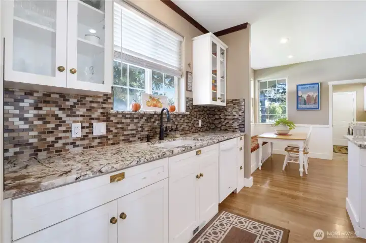Gourmet kitchen featuring granite countertops and custom cabinetry