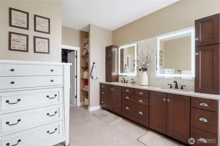 Spa-inspired en suite with double vanity and granite counters