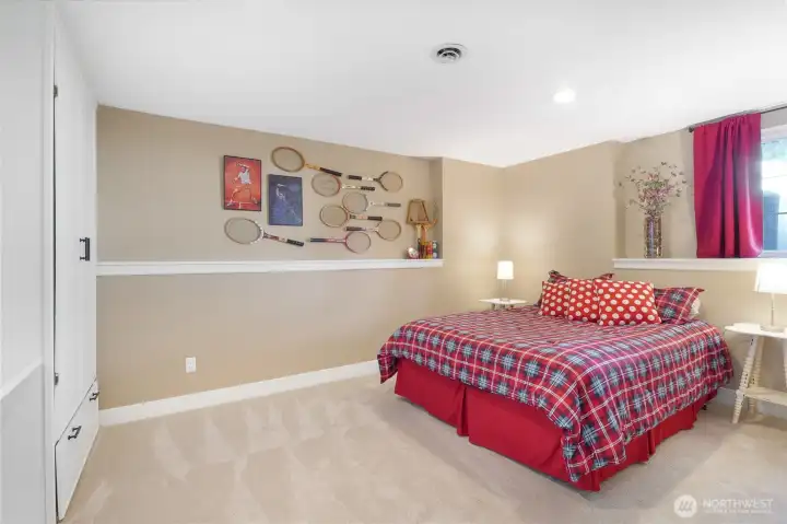 Bright secondary bedroom—perfect for guests or office use