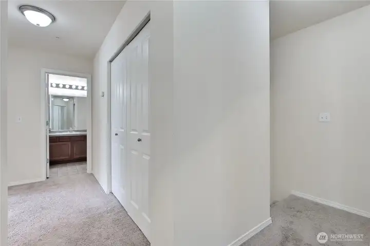 Landing at top of stairs has a storage closet.