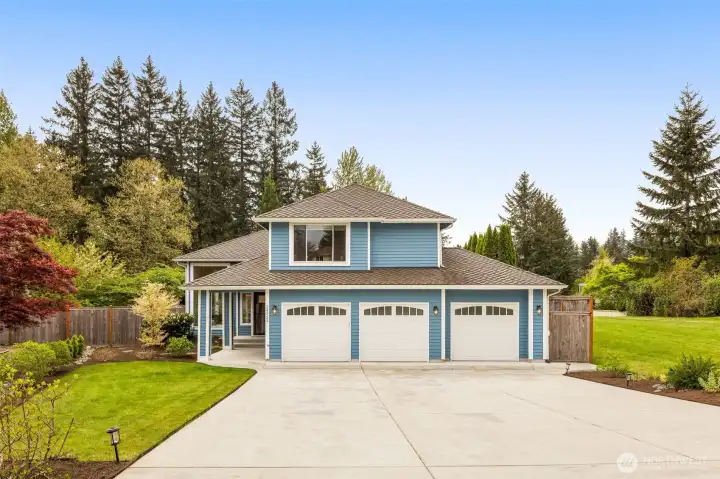 Highly desirable 3 car garage and extra long/extra wide driveway, offering abundant parking and impressive curb appeal