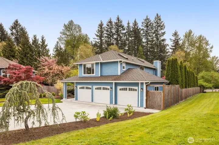 With no neighbors in the back or to the right, the home is bordered by green space on the right, creating a serene setting that’s hard to find.