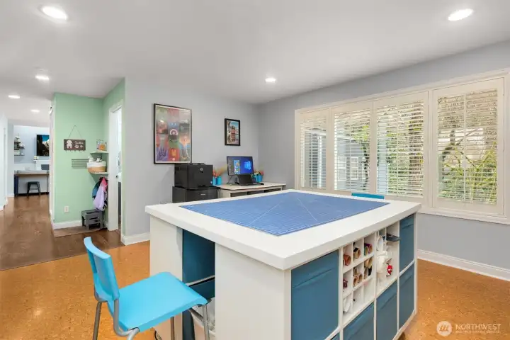 Main floor craft room is adjacent to the full bath and could be easily converted to a 5th bedroom.