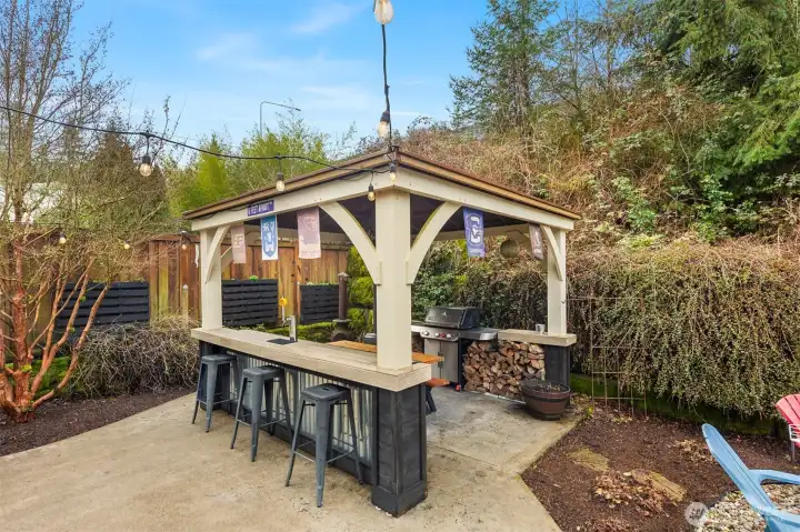 Party cabana with built-in keg tab and bar.