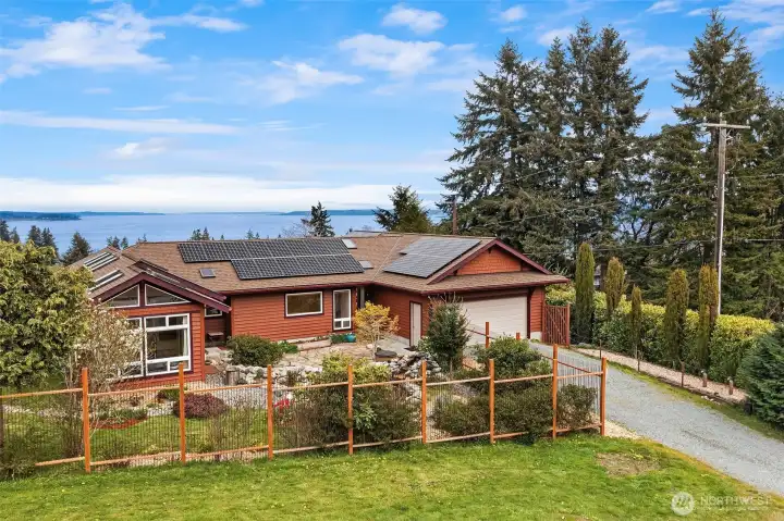 Beautiful custom-built, one-owner home within moments of ferries to Seattle. New roof and solar panels installed 2021/2022.