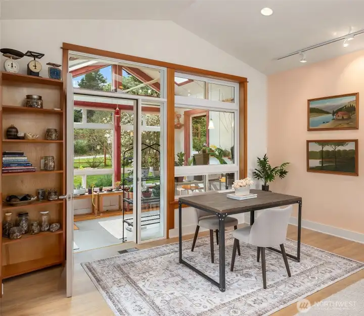 Sitting area in second bedroom. Conservatory/Atrium space is perfect for enjoying sunny winter days or growing tender plants like orchids or citrus. Lemon tree, anyone?